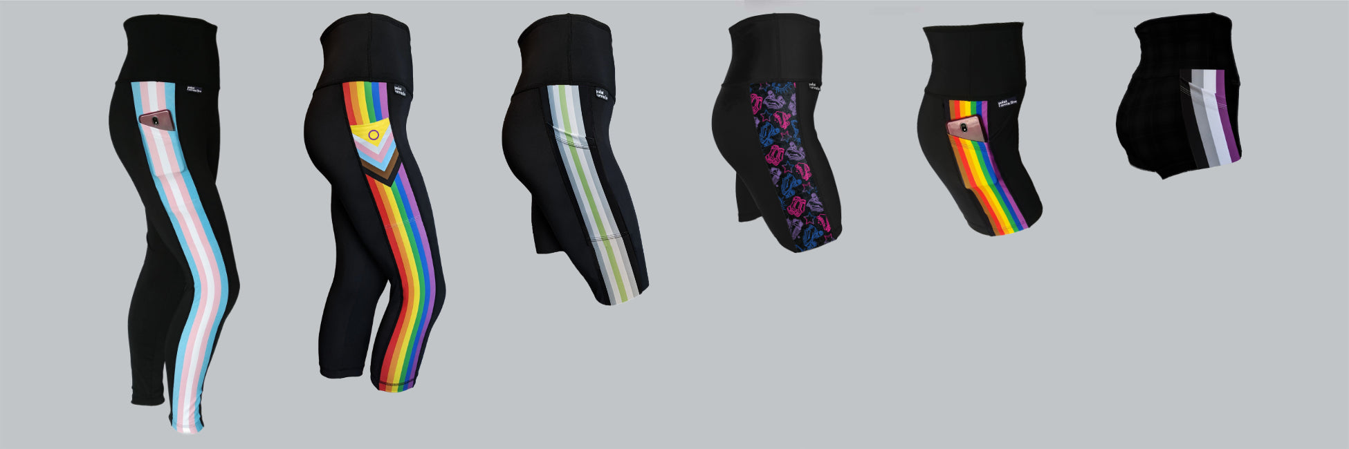 6 pairs of leggings against a grey background. Each pair is black in a different length with a printed pocket panel with different Pride themed prints. From left to right the flags are: Trans Pride, Intersex Inclusive Pride, Agender Pride, Bi flag coloured skate print, Philadelphia Pride, Ace Pride.
