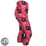 Load image into Gallery viewer, High-waisted, spandex Capri Length pocket leggings. The fabric has a bright pink background with yellow triangle shapes and large hand drawn cat heads with yellow eyes.
