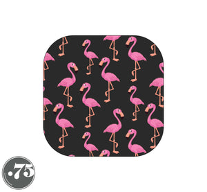 A closeup of the flamingo print fabric with a charcoal grey background with scattered cartoon pink flamingos on it.