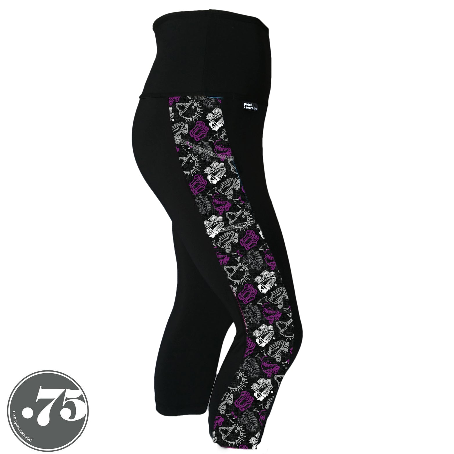 A pair of black spandex capri leggings on a mannequin, the leggings have a 3.5” wide stripe down the side that has a printed fabric with rollerskates, helmets, stars & knee pads. The graphics are in the colours of the Ace Pride Flag, Black, Grey, White & Purple.