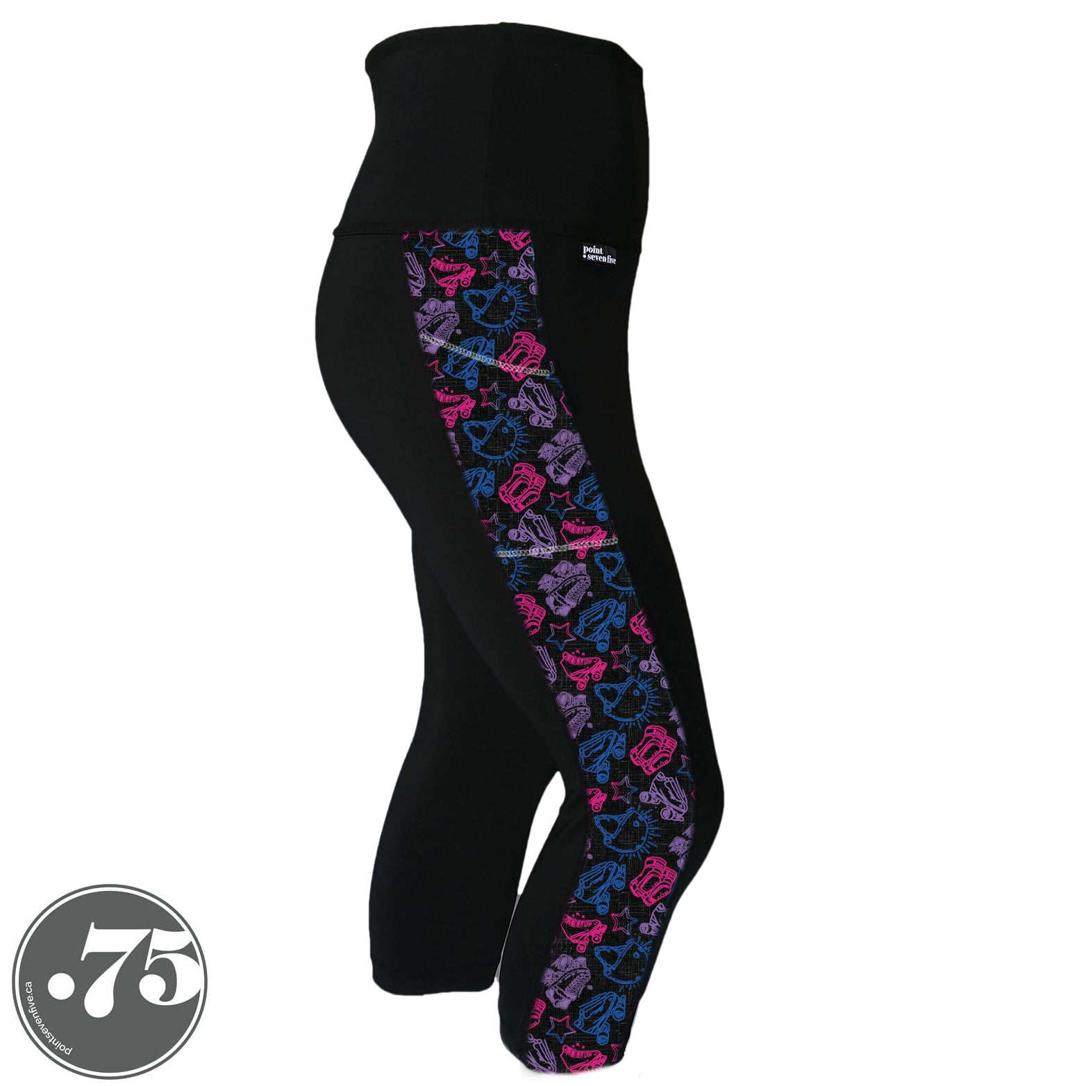 A pair of black spandex capri leggings on a mannequin, the leggings have a 3.5” wide stripe down the side that has a printed fabric with rollerskates, helmets, stars & knee pads. The graphics are in the colours of the Bi Pride Flag pink, purple and blue.