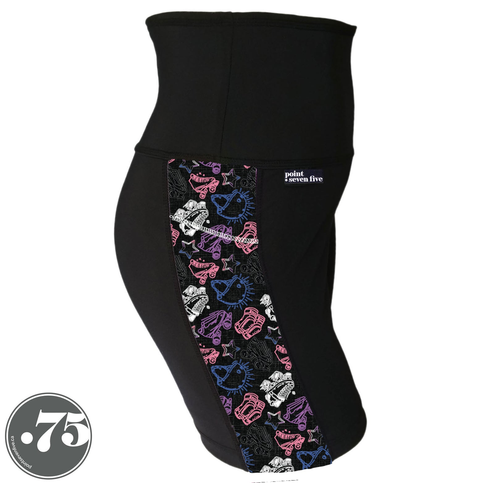 A pair of black spandex lift length shorts on a mannequin, the leggings have a 3.5” wide stripe down the side that has a printed fabric with rollerskates, helmets, stars & knee pads. The graphics are in the colours of the Gender Fluid Pride Flag colours white, pink, blue and purple. 