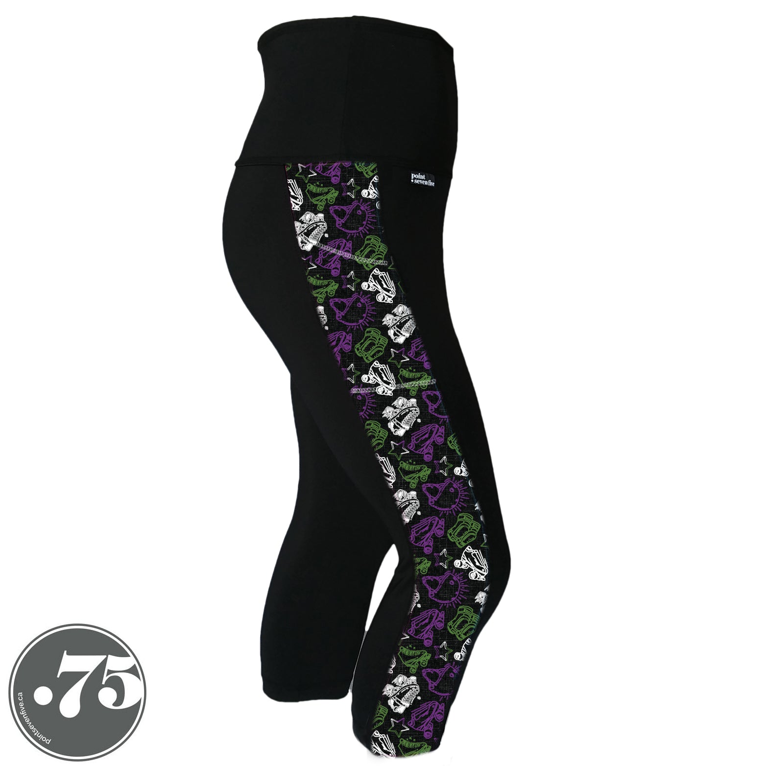 A pair of black spandex capri leggings on a mannequin, the leggings have a 3.5” wide stripe down the side that has a printed fabric with rollerskates, helmets, stars & knee pads. The graphics are in the colours of the Genderqueer Pride Flag green, purple and white. 